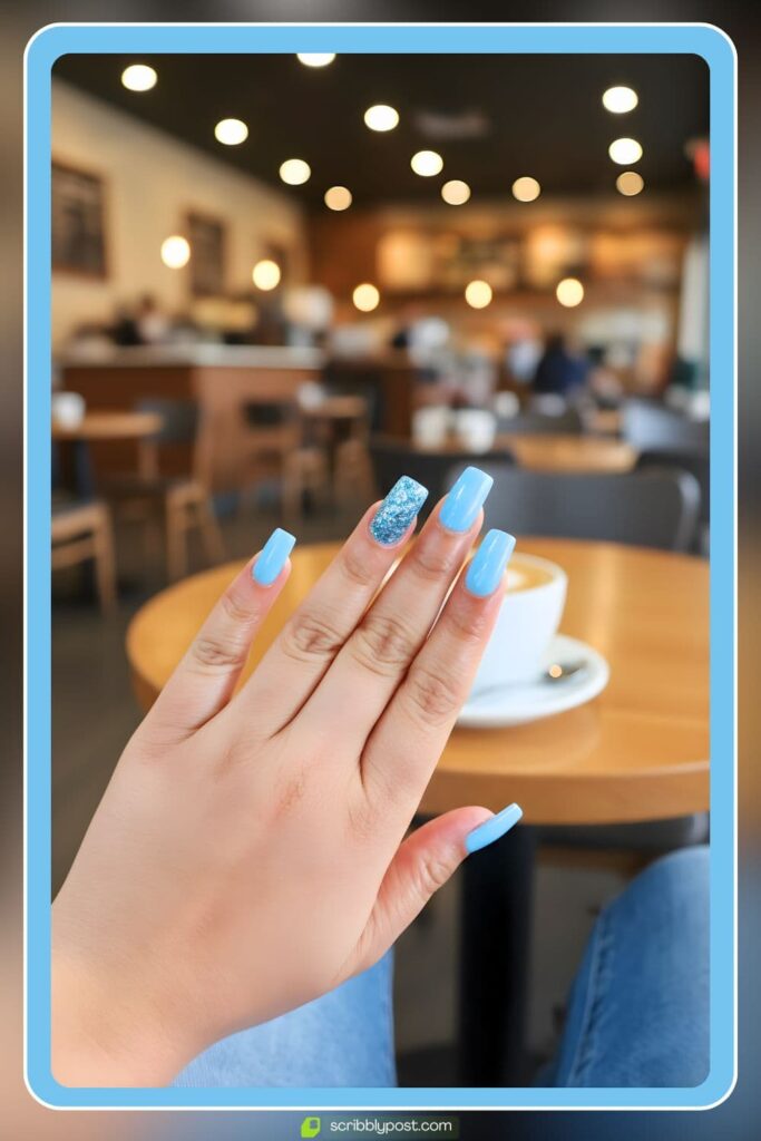 Sky blue nails with glitter