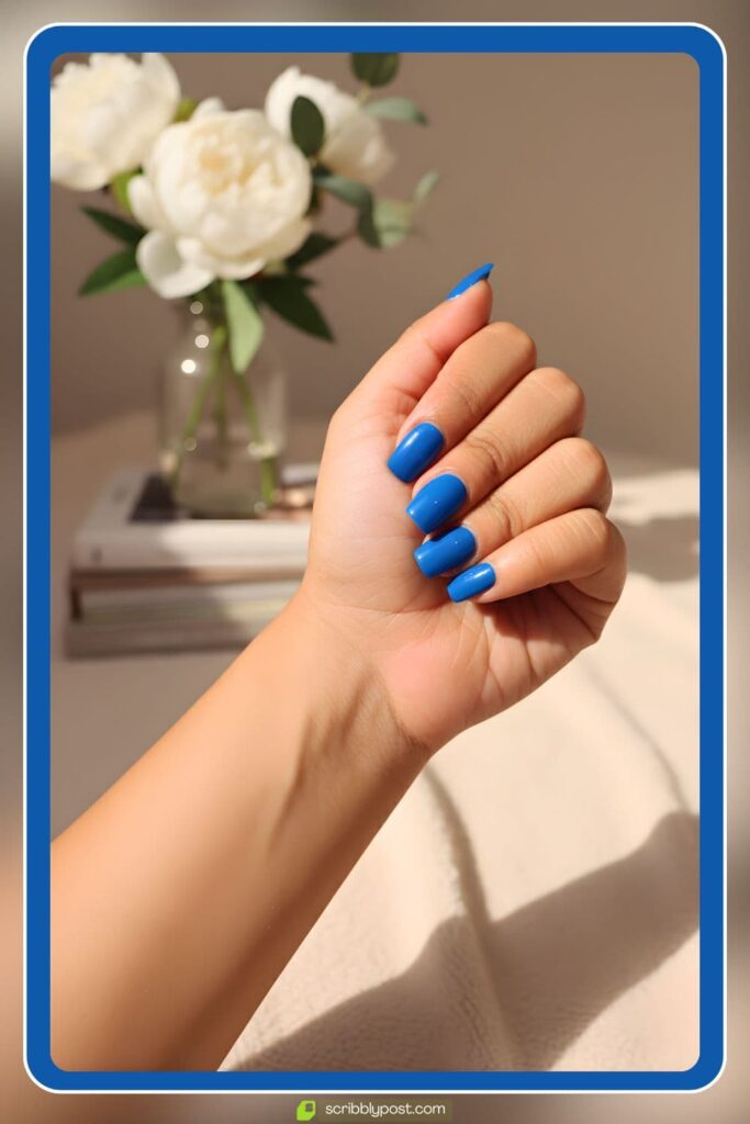 Solid blue glossy nail design