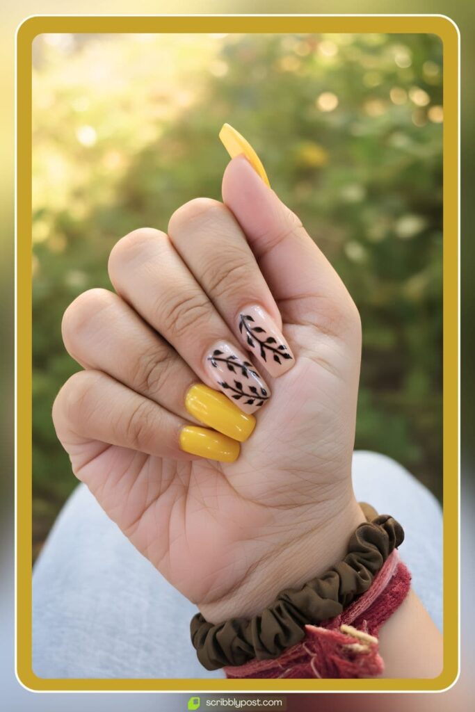 Yellow nails with leaf art