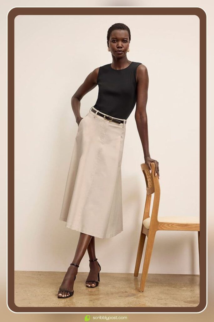 A-Line Midi Skirt with a Tucked-In Sleeveless Top