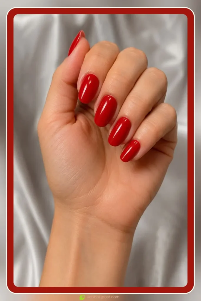 Saturated glossy red polish on all ten nails, Bold Solid Red Design, best nail designs