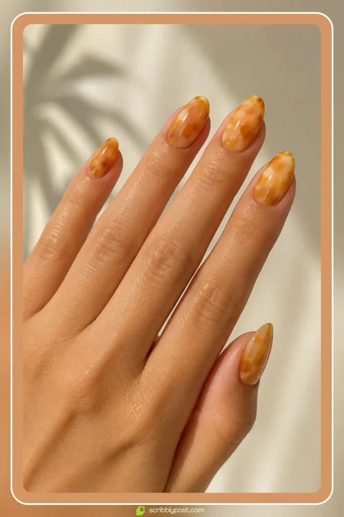 Light caramel and honey toned tortoise shell nails with golden glow