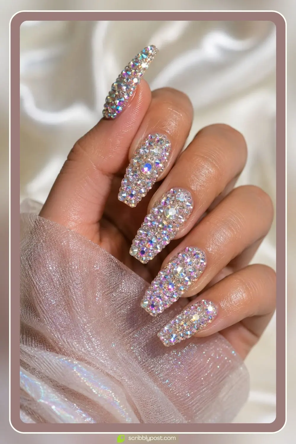 Fully crystal encrusted glamorous rhinestone nails sparkling on all ten nails