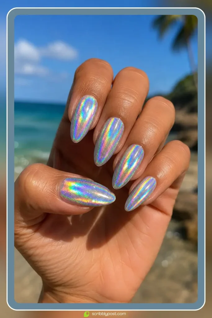 Holographic chrome nails flashing rainbow light in direct sun