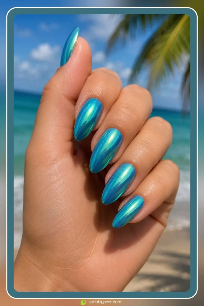 Teal chrome nails with green and blue shifting mermaid finish