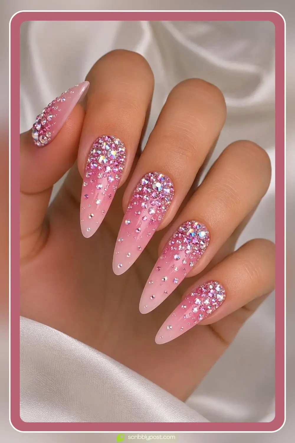 Ombre nails with rhinestones cascading from dense at the cuticle to sparse at the tip
