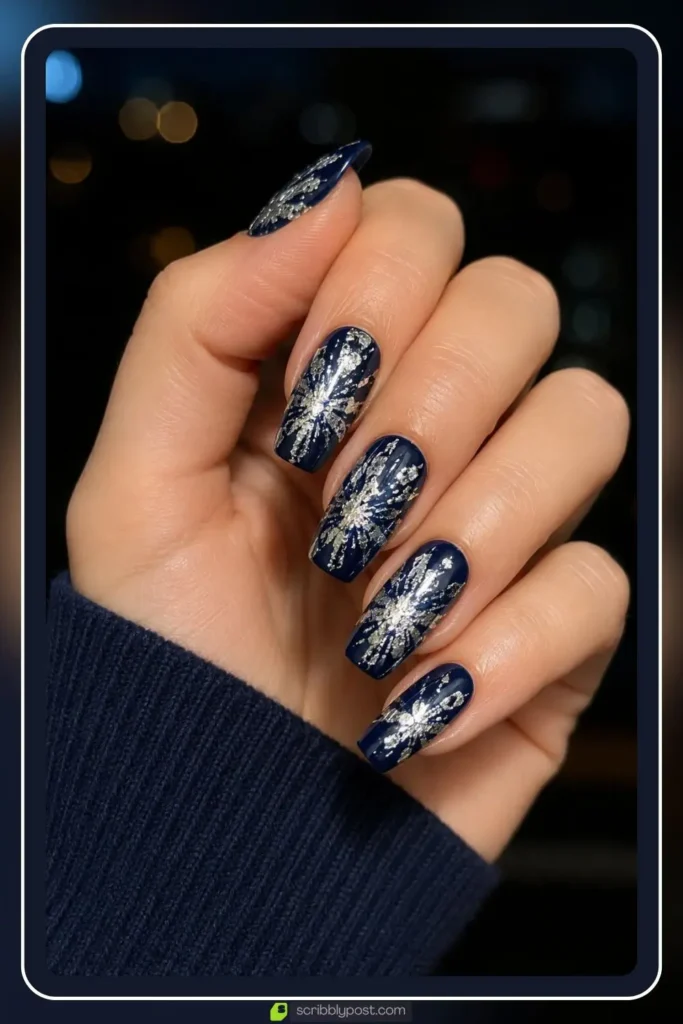 crinkled silver foil on navy base nail art firework burst effect medium length