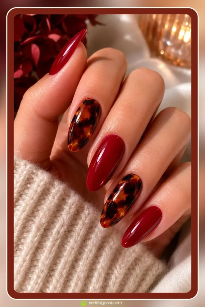 Mixed manicure alternating cherry red solid nails with tortoise shell pattern nails