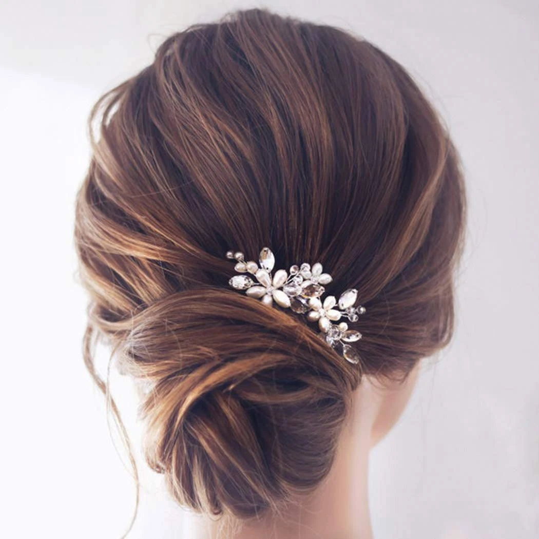 Decorative hair clip for a beach wedding guest hairstyle