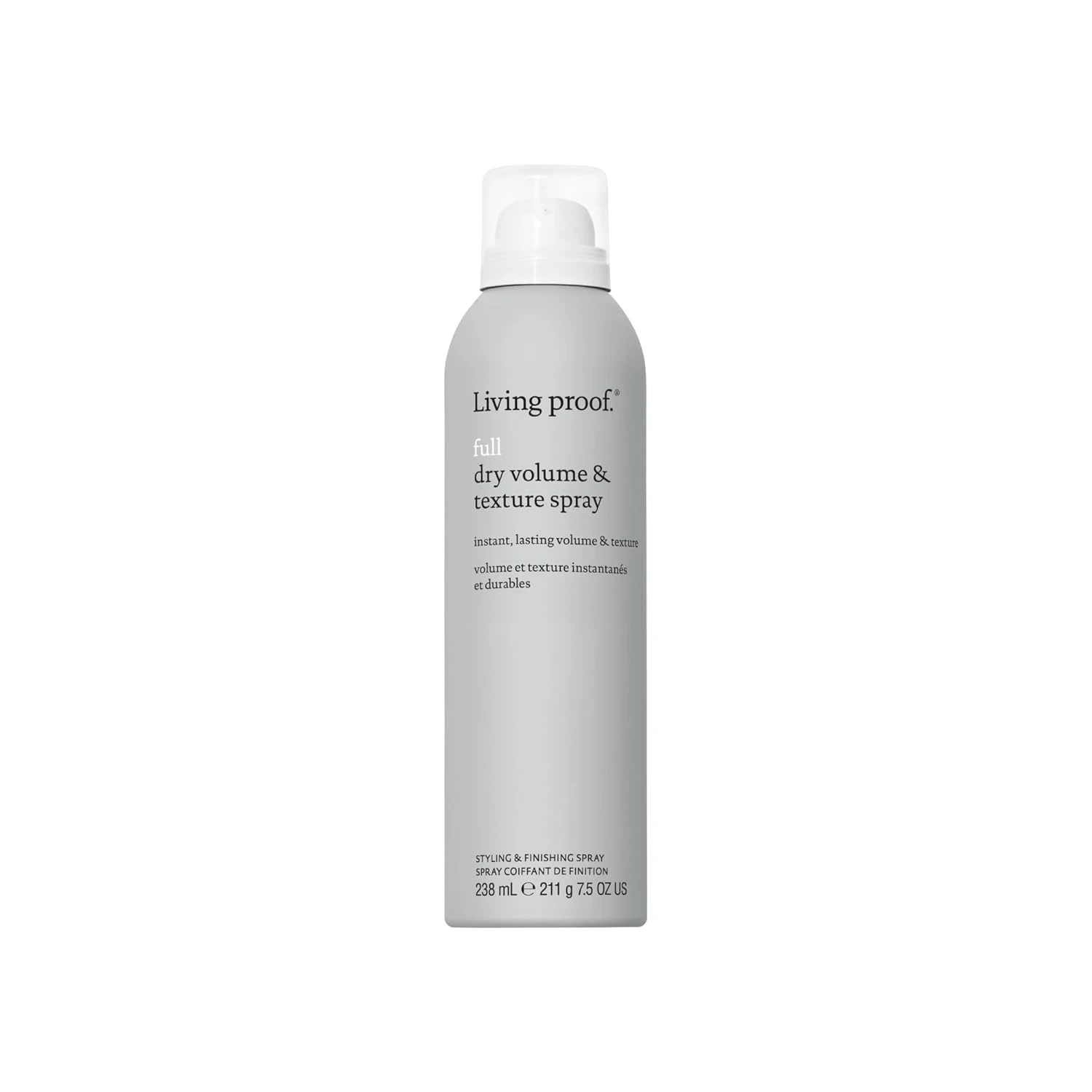 Dry texture spray for volume and hold in a beach wedding guest look