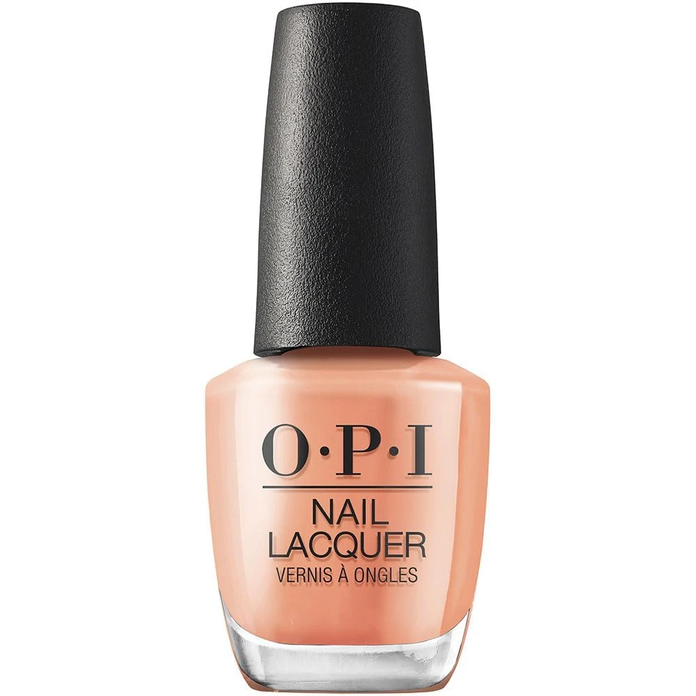 Sheer apricot nail polish for a warm clean girl nail look