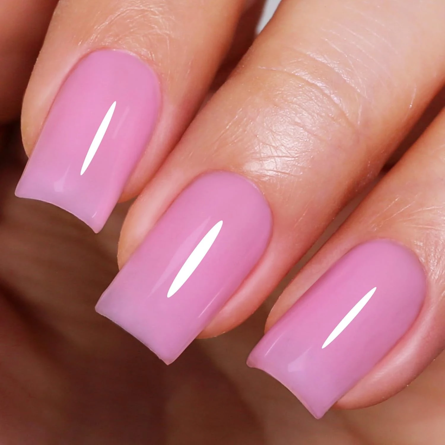 Sheer baby pink jelly nail polish for a glassy clean girl nail look