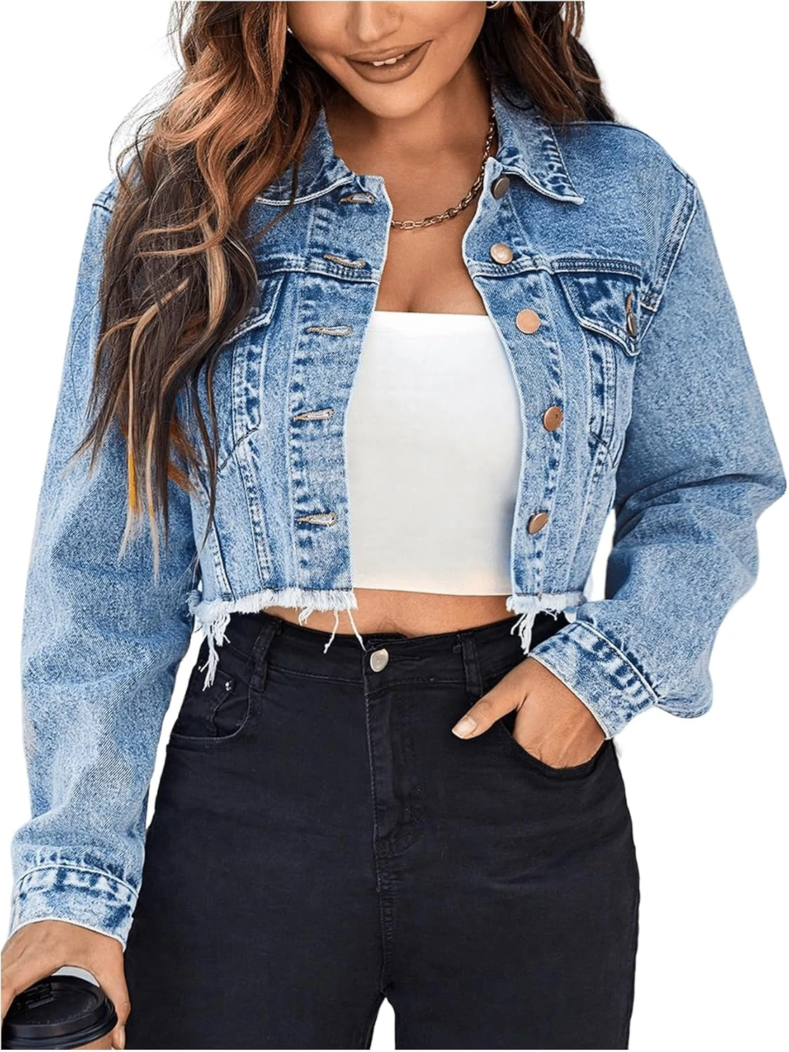 Cropped denim jacket layered over white boho slip dress