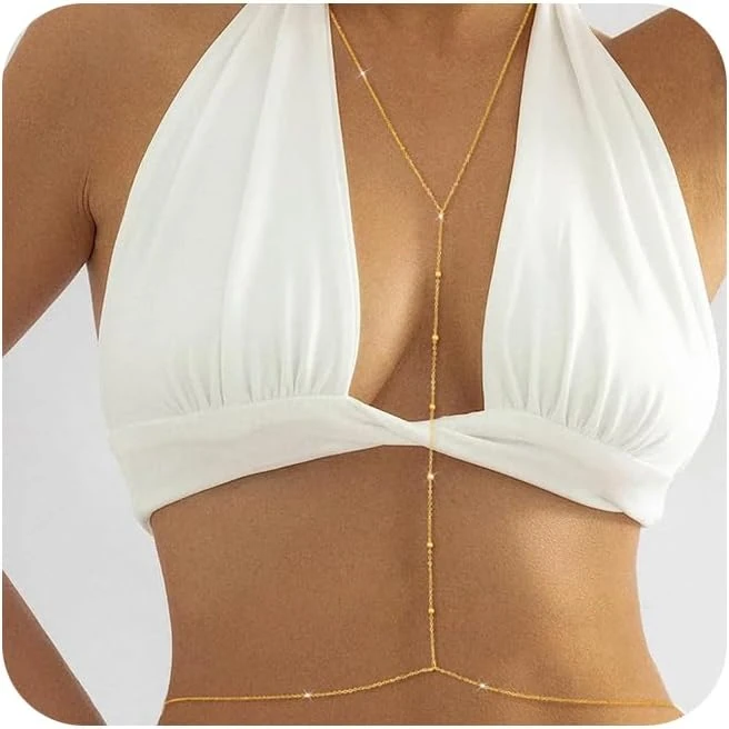 Gold body chain for open back black evening dress styling