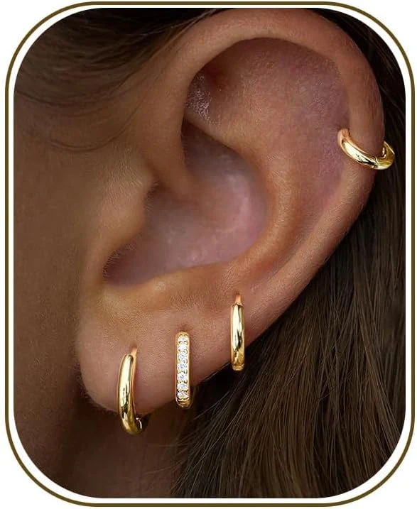Gold huggie earrings for black midi evening dress looks