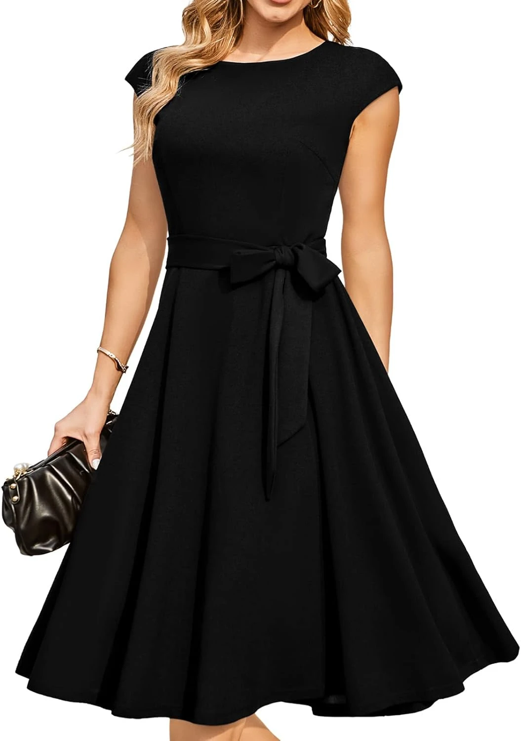 knee length little black dress for an engagement party guest