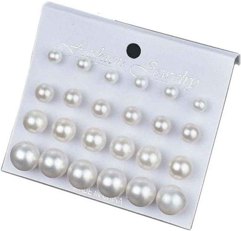 pearl stud earrings for a tea length engagement party look