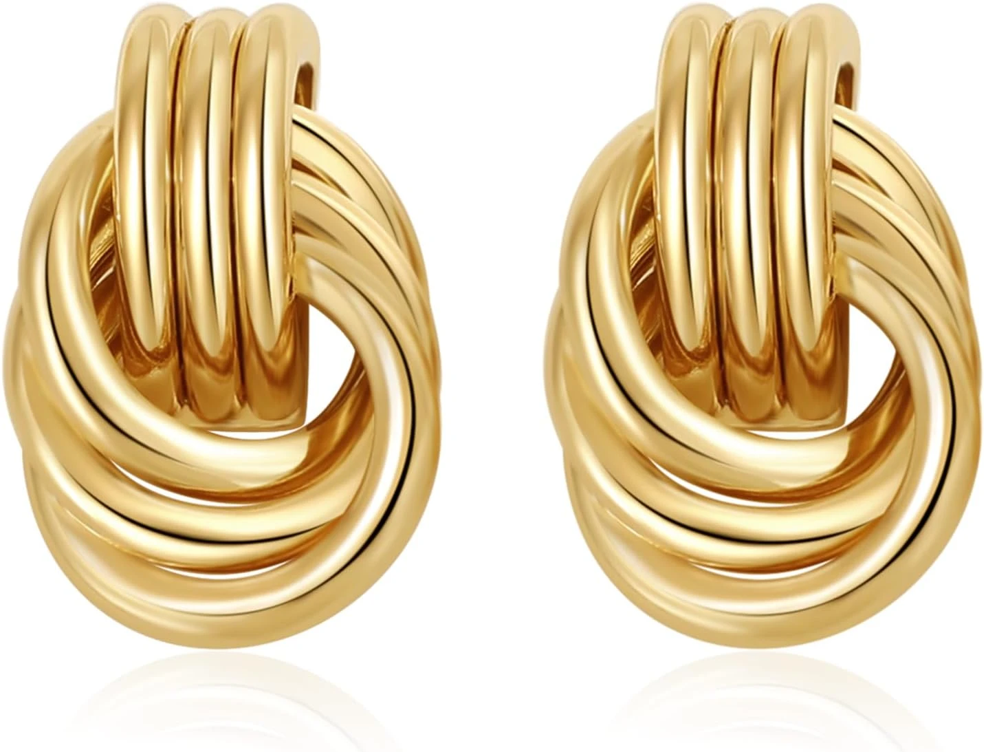 statement gold earrings for a halter neck engagement party look