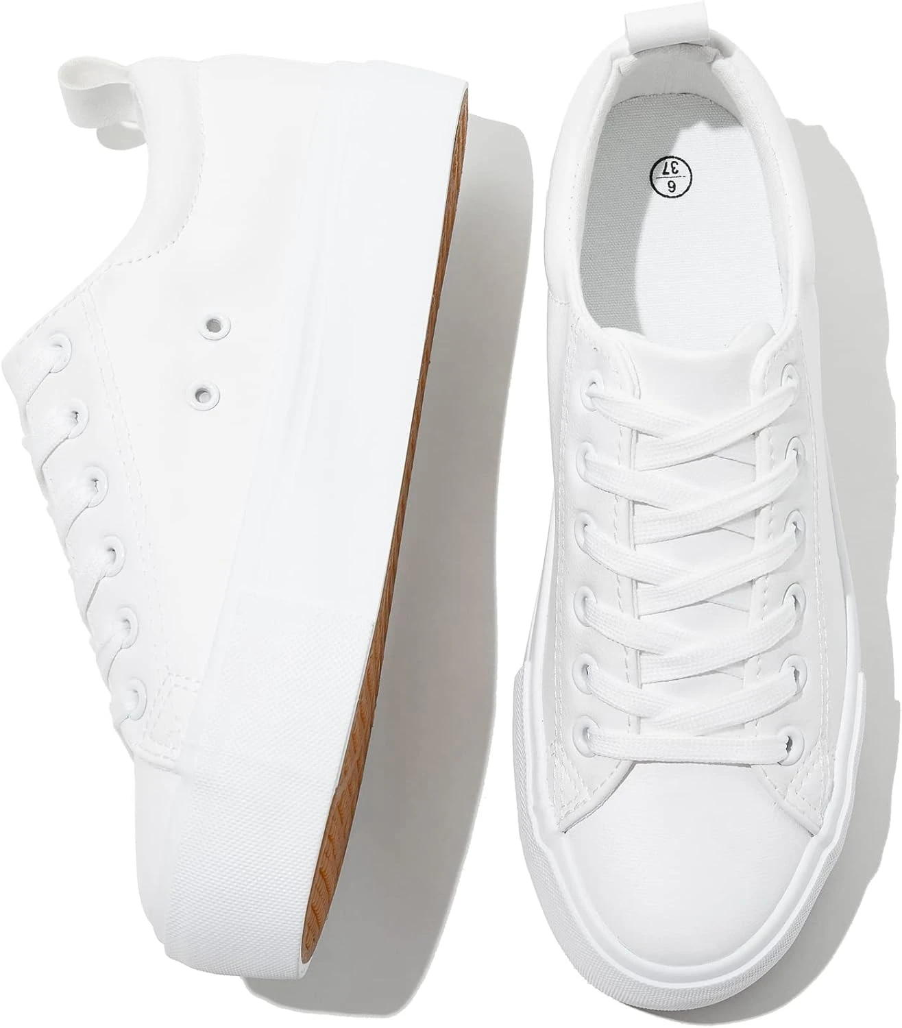Women's clean white platform sneakers for a varsity jacket outfit