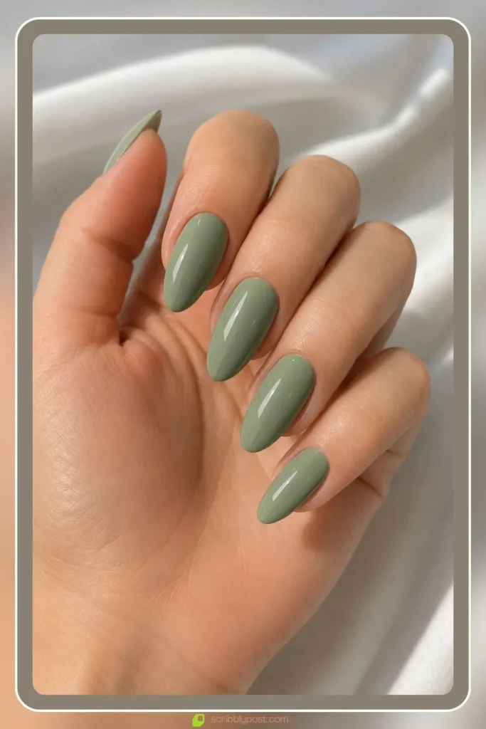 Almond sage green nails in soft salon set with tapered shape