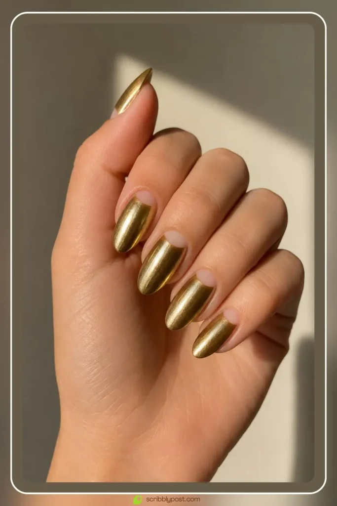 Antique gold half moon nails with bare crescent at cuticle