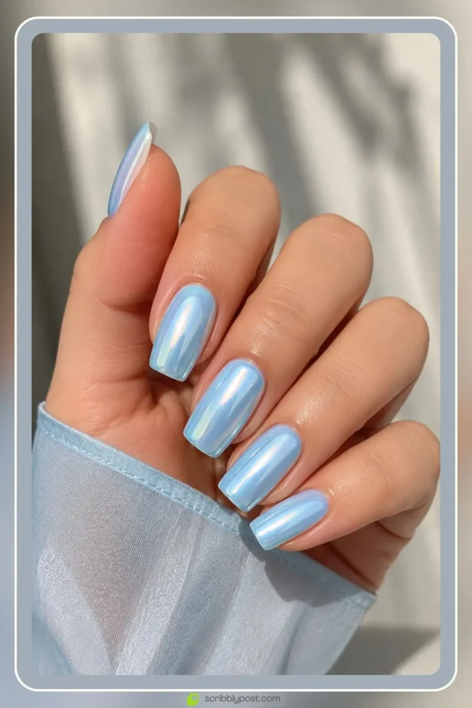 Baby blue chrome nails with icy pearl shimmer