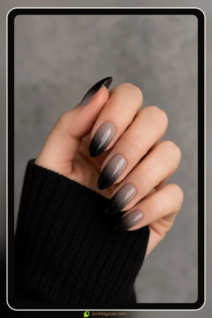 Black tips fading to grey base black ombre nails moody