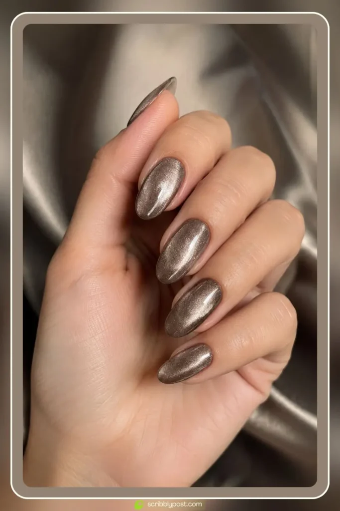 Classic velvet cat eye nails with diffused shimmer glow on almond shape