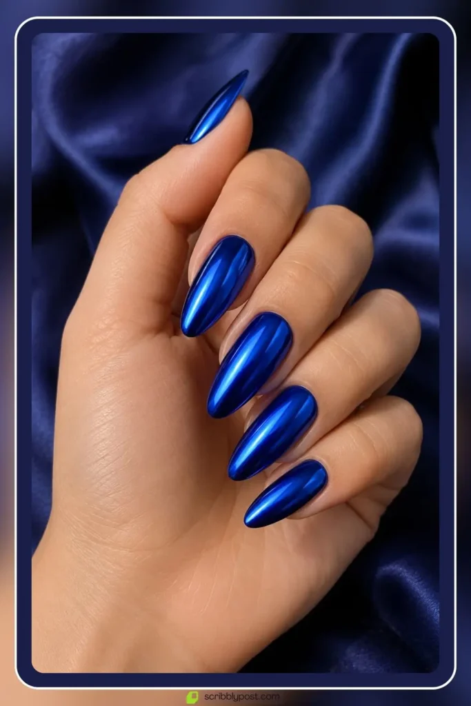 Cobalt blue chrome nails with deep metallic shine