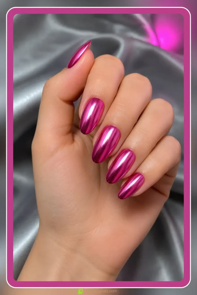 Fuchsia chrome nails with metallic pink mirror shine