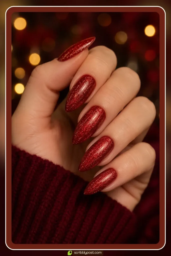 Holiday velvet nails with glitter shimmer over festive red