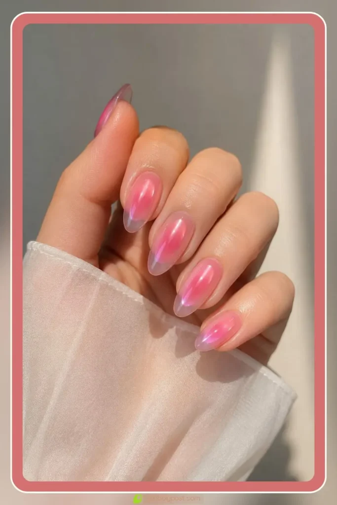Translucent pink jelly aura nails with glossy glass-like shine