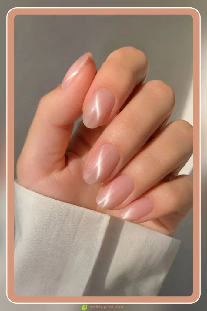 Sheer nude base with bright magnet streak Korean glass nails