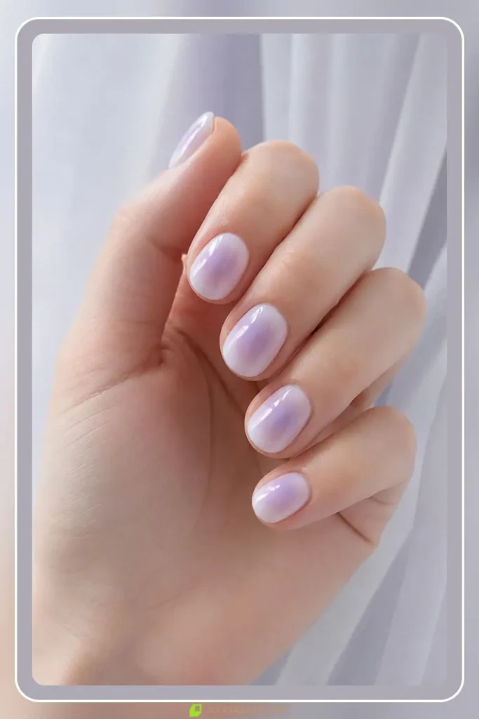 Lavender haze aura on milky white short round nails
