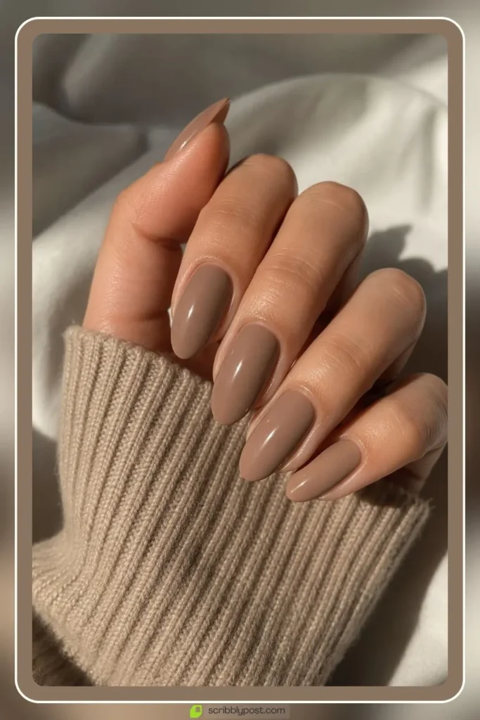 Light brown latte nails in creamy solid on almond shape