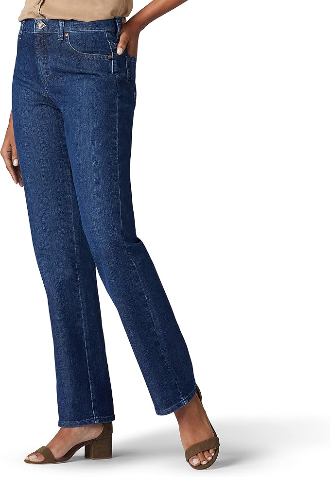 Light wash relaxed jeans for red boots look