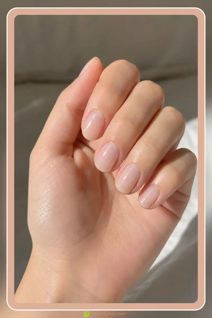Sheer milky clear glass nails on short round natural nails