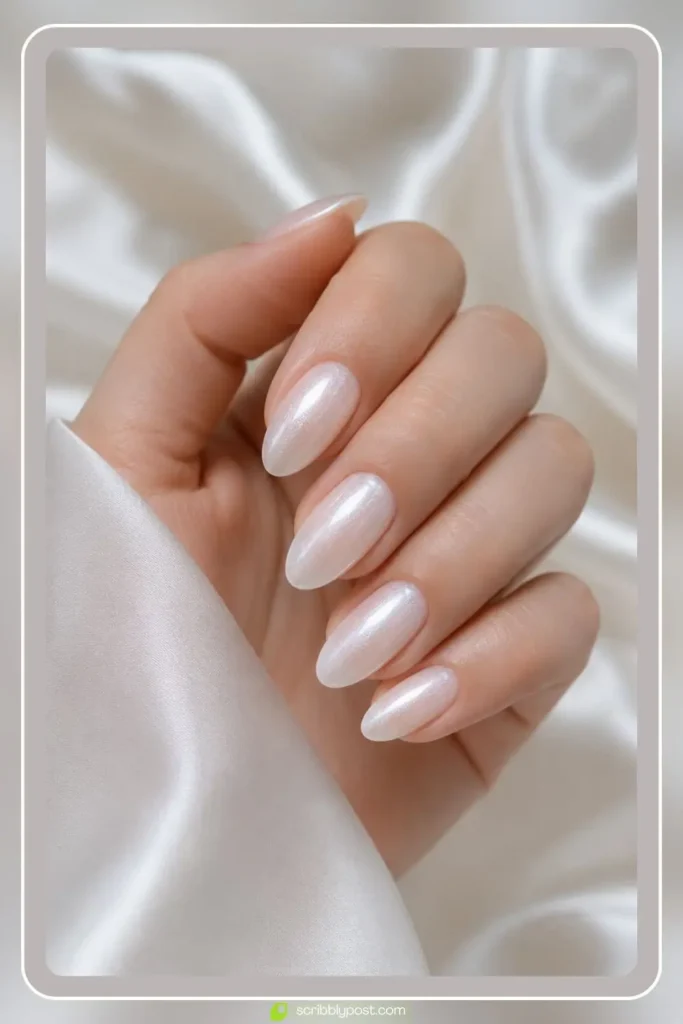 Milky velvet nails with pearl shimmer and soft white glow