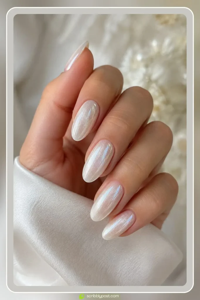 Pearl white nails with luminous shimmer for bridal set