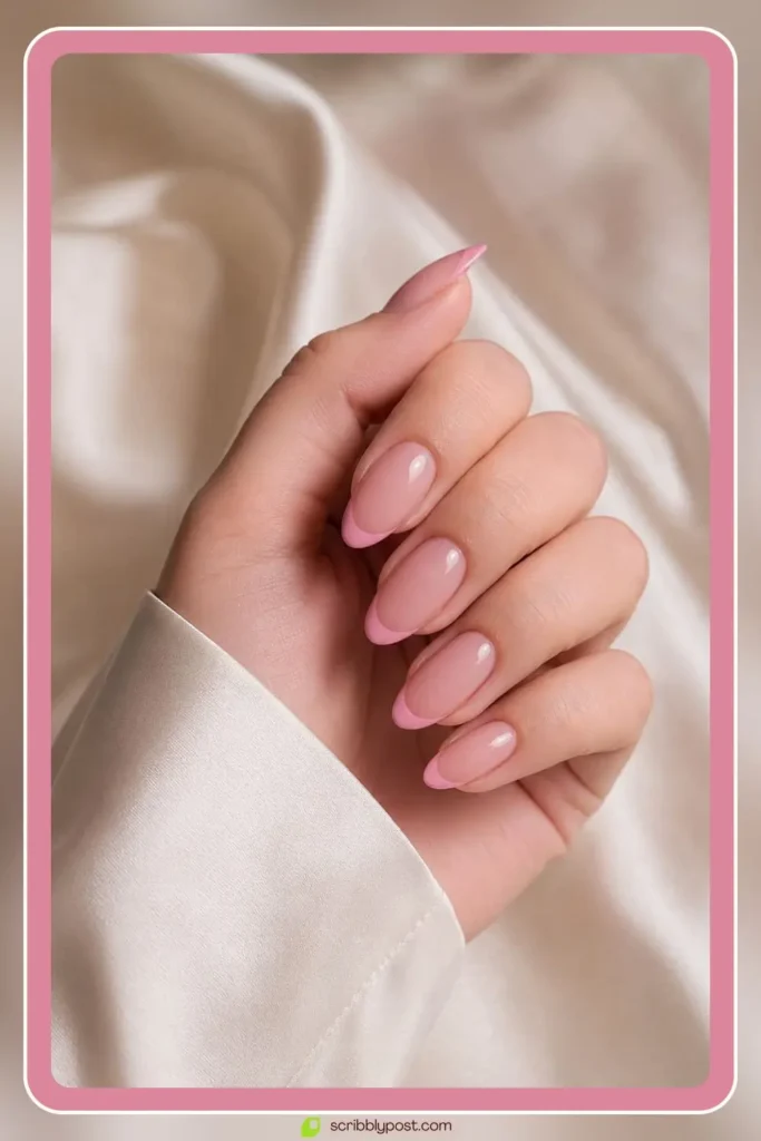 Pink french tip nails with rosy tips on sheer base