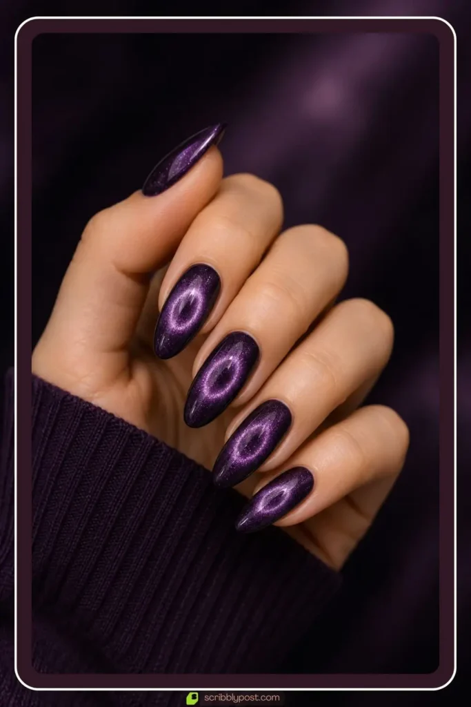 Purple cat eye nails with glowing ring effect in amethyst tone