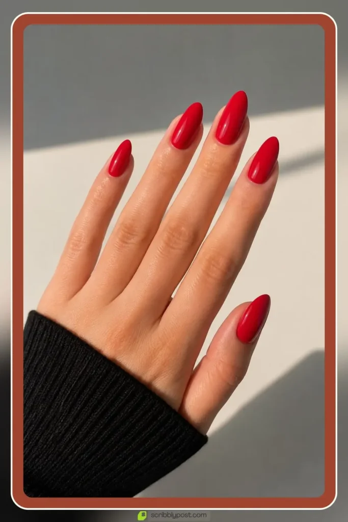 Red Nails for Every Plan: 16 Sets Sorted by the Occasion in 2026 5 Red almond nails in timeless glossy solid