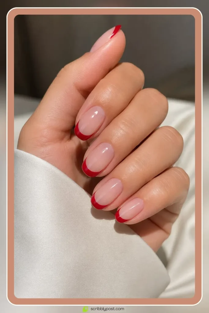 Red Nails for Every Plan: 16 Sets Sorted by the Occasion in 2026 49 Red french tip nails with crimson tips on sheer base