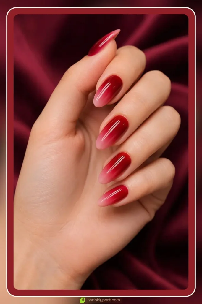 Deep red blending into soft pink red ombre nails for evening