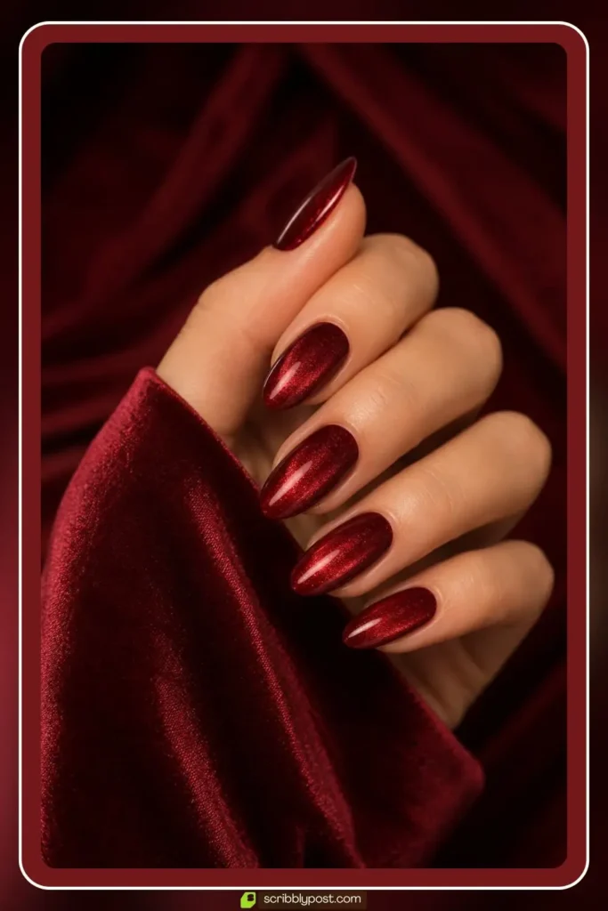 Red velvet nails with plush crimson shimmer glow