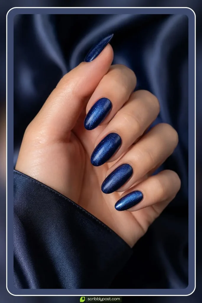 Sapphire velvet nails with deep blue shimmer glow