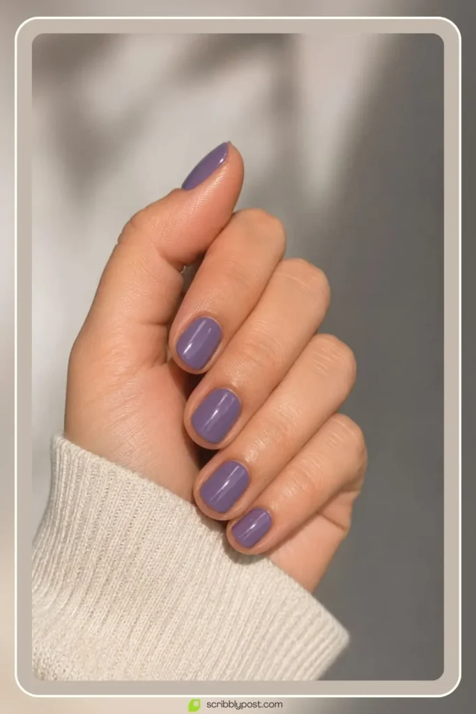 Short purple nails in muted minimal solid