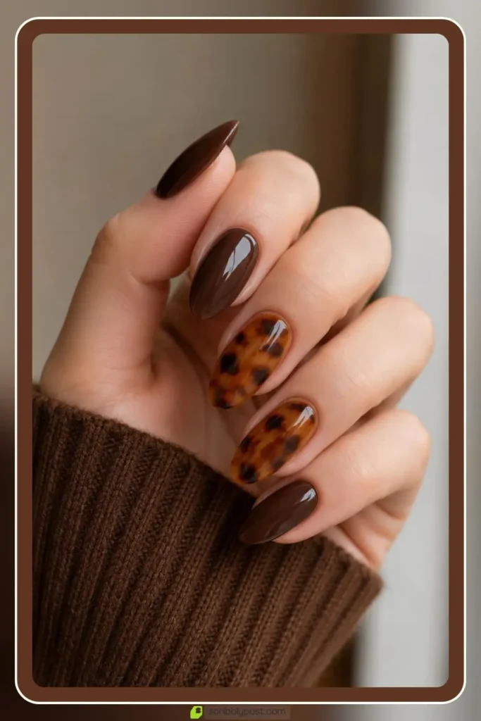 Brown nails with tortoise shell accent nails in amber