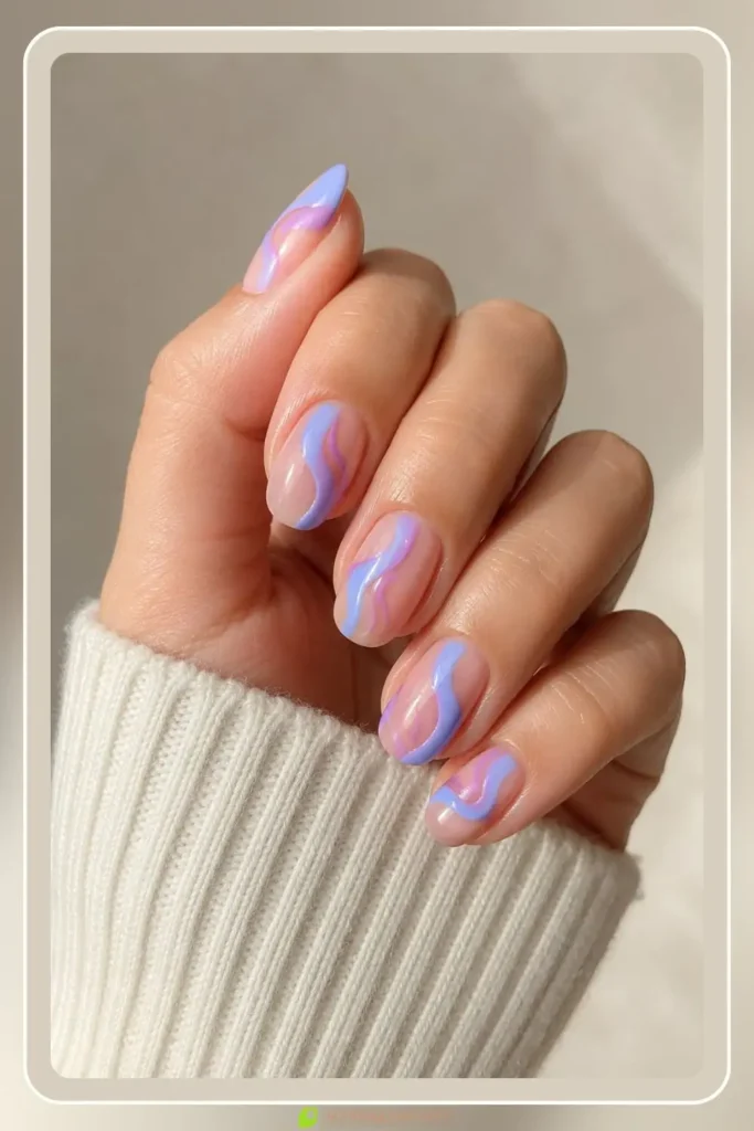 Two soft pastel colors swirled into a loose line, Two-Tone Swirls, playful minimal manicure