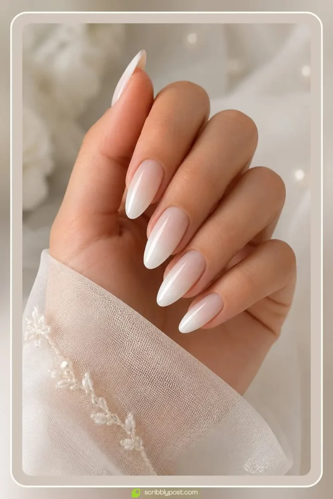 White almond nails in elegant bridal shape and soft finish